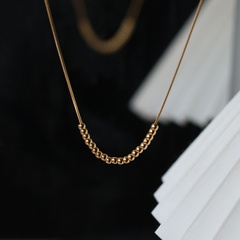 neue goldene Bohnen süße schöne OL Mode runde Perlen Schlangenknochen Halskette Titanstahl 18K