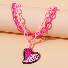 Version coréenne du collier coeur de pêche rose en résine de personnalité de la mode tendance tout-match