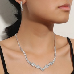 Geometrische gebogene Halskette und Ohrringe für Damenmode