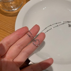 Korean titanium steel hollow heart pendant niche clavicle chain wholesale