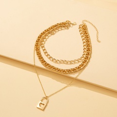 European and American new retro peach heart hollow lock multilayer necklace female