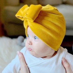 autumn and winter children's warm hats for infants and toddlers solid color bowknot flannel caps thickened 8 colors