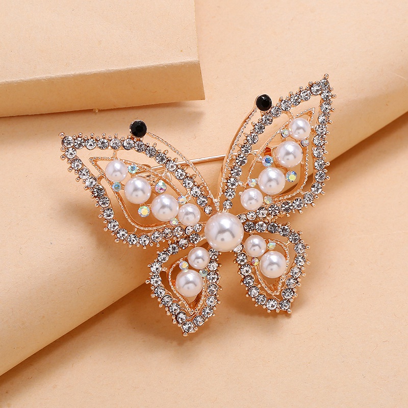 Tendance corenne jolie broche mode simple rtro luxe exquise broche papillon perle