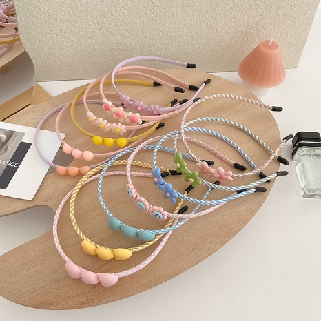 Korean candy-colored children's hair bands simple heart flowers hair accessories's discount tags