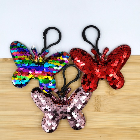 Porte-clés à paillettes réfléchissantes de couleur Pendentif de sac papillon à la mode européenne et américaine NHDI496154's discount tags