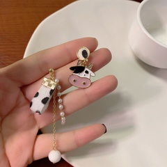 Korea cute asymmetric cow earrings fashion alloy earrings