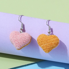Korean creative popular knitted wool peach heart earrings wholesale