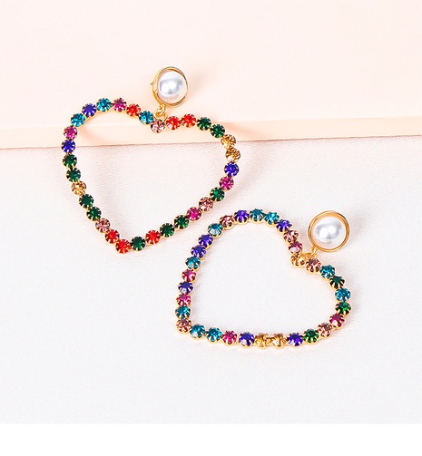 European and American Geometric Alloy Diamond-Embedded Heart-Shaped Full Diamond Rhinestone Pearl Earrings Women's Fashion Graceful Geometric Claw Chain Earrings's discount tags