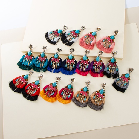 New fashion alloy diamond-studded acrylic turquoise fan-shaped tassel earrings's discount tags