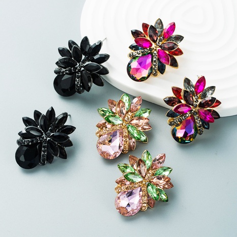 Boucles d'oreilles en forme de fleur de diamant de verre en alliage de série de diamants de couleur de mode en gros NHLN465571's discount tags