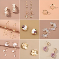 European and American fashion creative butterfly C-shaped flower resin earrings