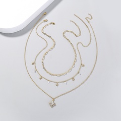 Collier pendentif étoile à six branches sens du design collier multicouche chaîne clavicule empilable