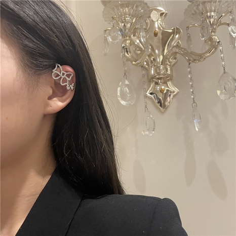 simple hollow bow copper ear bone clip earrings's discount tags