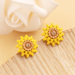 Version coréenne de jolies boucles d'oreilles de personnalité de fleur de marguerite en gros