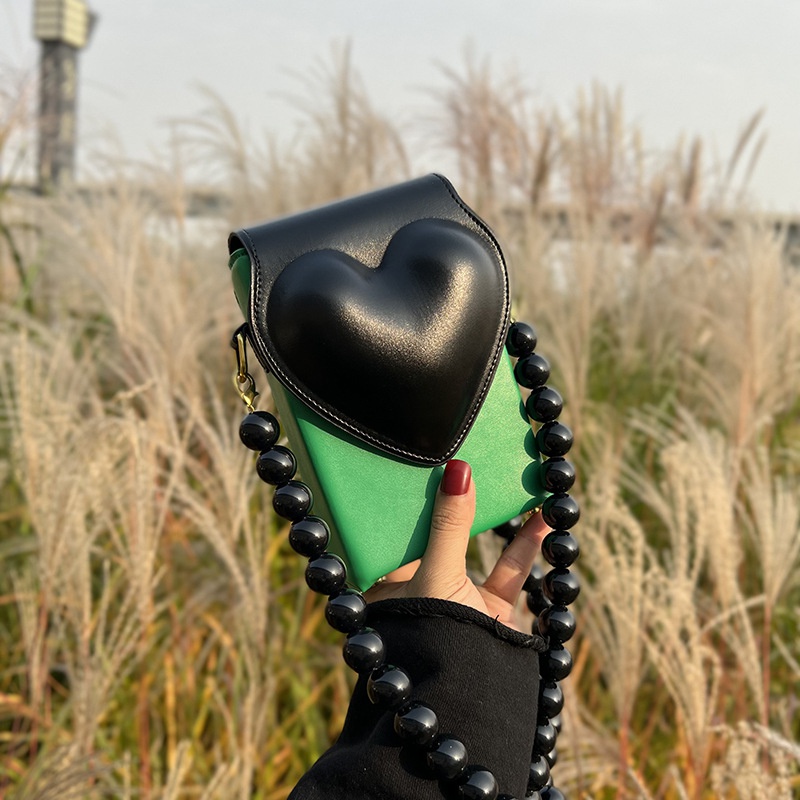 Neue Schachbretttasche Herzform Mode eine Schulter Messenger Perlentasche Grohandel