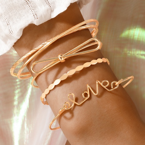 Bijoux de mode européens et américains noeud d'arc bracelet ouvert ensemble de bracelet géométrique en quatre pièces's discount tags