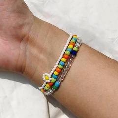 Europäische und amerikanische Strandart-Farbperlen kleine Gänseblümchen Mode einfaches dreiteiliges Armband