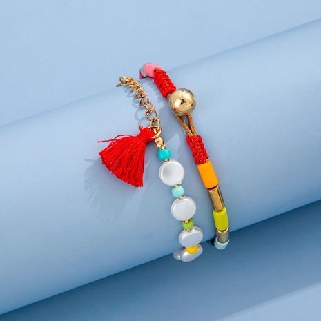 Estilo bohemio nuevo color de pintura tubo de empalme perla borla pulsera moda conjunto de dos piezas's discount tags