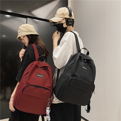 Schoolbag Korean version of the large-capacity travel simple backpack new fashion student backpack's discount tags