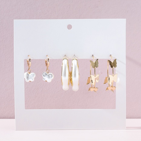 Bijoux de mode européens et américains simples imitation perle papillon boucle d'oreille ensemble de boucles d'oreilles's discount tags