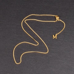 Wholesale European and American style avatar English character M sideways long necklace titanium steel 18K gold material