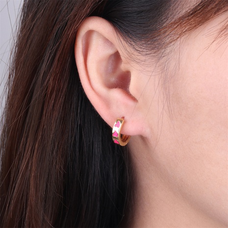 Boucles d'oreilles simples en huile de goutte d'amour de couleur nouvelles boucles d'oreilles en cuivre plaqué or à la mode en gros's discount tags