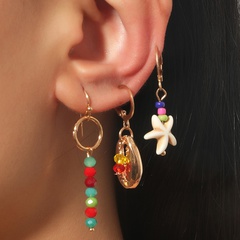 Boucles d'oreilles en perles de riz de coquille de personnalité faites à la main européennes et américaines ensemble créatif boucles d'oreilles en cristal étoile bijoux
