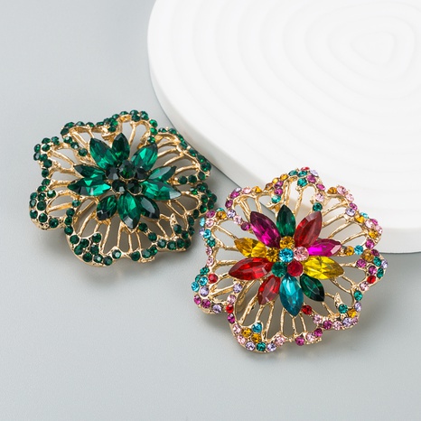 European and American creative fashion color rhinestone alloy hollow flower brooch's discount tags
