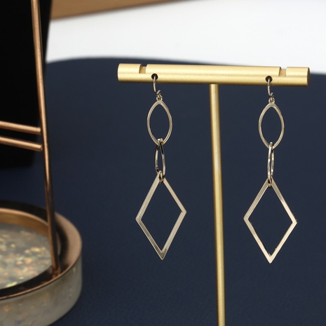 Boucles d'oreilles pendantes en cuivre à chaîne d'épissage géométrique à la mode's discount tags