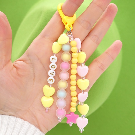 new bohemian style LOVE round beads rice beads peach heart bag keychain earphones mobile phone pendant's discount tags