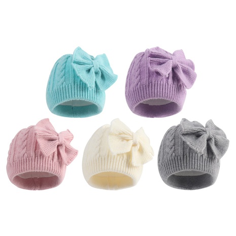 Bonnet tricoté bowknot pour enfants européens et américains hiver nouveau chapeau nouveau-né chaud et épais's discount tags