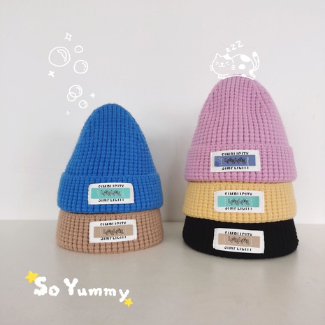 Korean children's winter warm knitted hat fashion cloth label letter woolen hat's discount tags