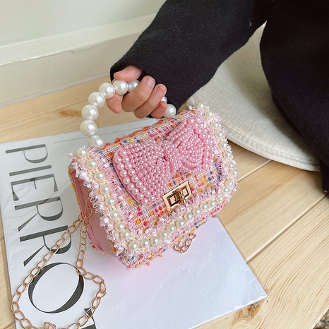 Autumn and winter new fashion pearl bowknot woolen children's portable messenger small square bag's discount tags