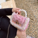 Autumn and winter new fashion pearl bowknot woolen childrens portable messenger small square bagpicture7