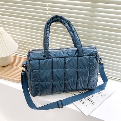 2021 winter new solid color plaid pattern shoulder messenger portable bag's discount tags