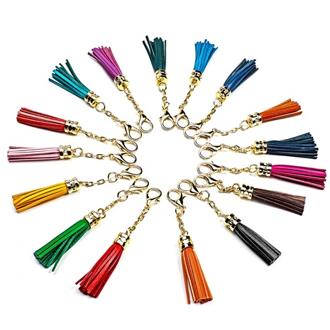 Fashion Korean Hot Sale Leather Tassel Alloy Keychain Car Ornament Small Gift's discount tags
