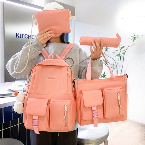Korean style large capacity canvas handbag shoulder bag pencil case backpack four-piece set's discount tags