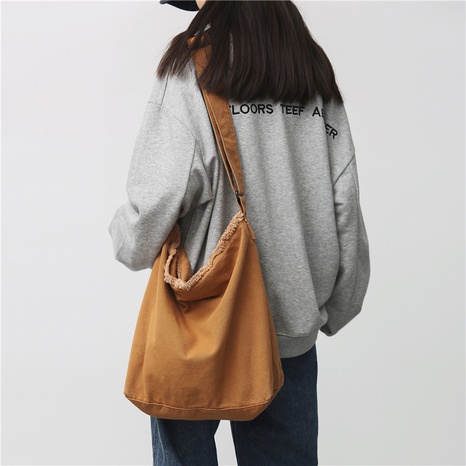solid color canvas large-capacity class shoulder diagonal bag's discount tags