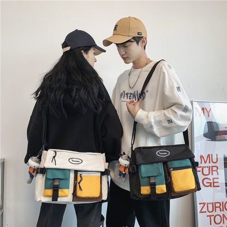 Contrasting color large capacity canvas shoulder bag Korean casual single shoulder messenger bag's discount tags