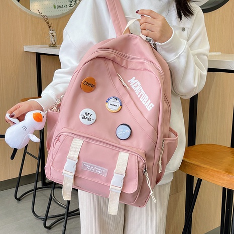 2021 new backpack Korean version large-capacity backpack casual schoolbag's discount tags