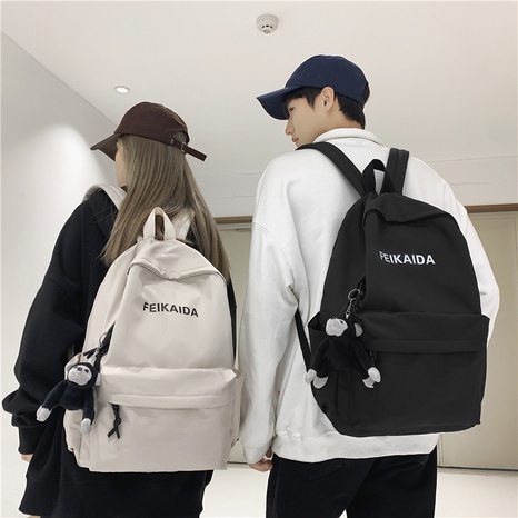 Korean version of backpack large capacity solid color letter backpack's discount tags