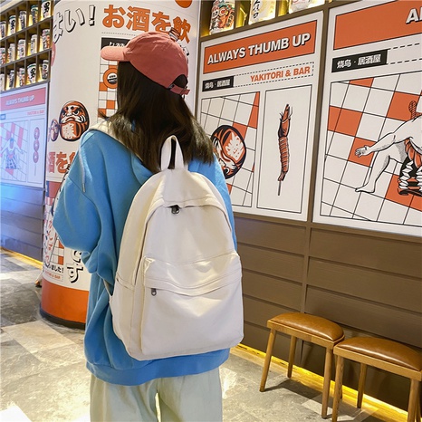 Korean version of canvas backpack campus school bag pure color backpack's discount tags
