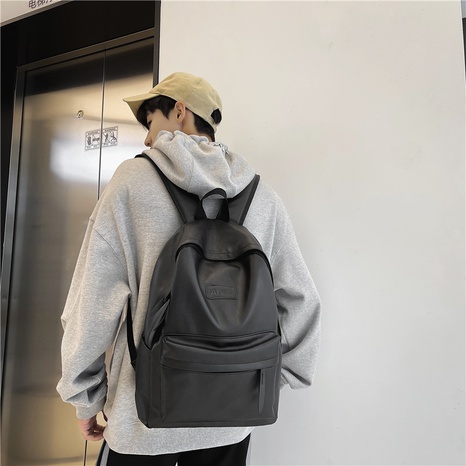 Korean solid color large-capacity PU leather backpack's discount tags