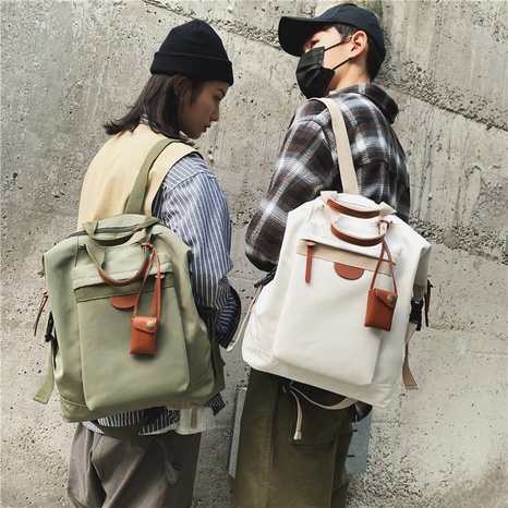 Versión coreana de la mochila simple y liviana bolso retro de color sólido's discount tags