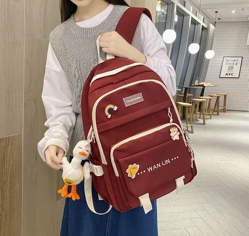2021 schoolbag Korean style hit color letter pattern backpack's discount tags