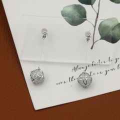 Metallic fashion geometric hollow flower ball copper earrings