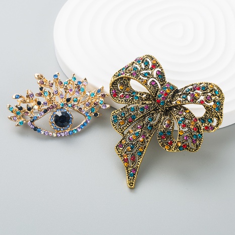 European and American fashion color rhinestone bow brooch cute brooch accessories NHLN523965's discount tags