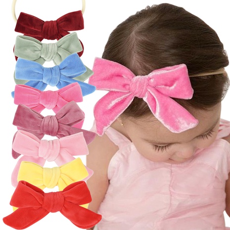 baby solid color velvet stretch seamless nylon bow headband's discount tags