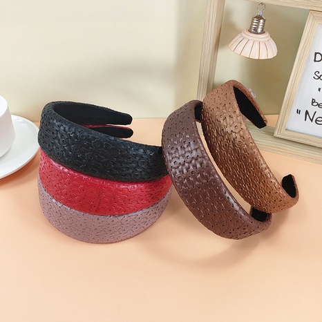 Korean pure color PU leather sponge headband wholesale's discount tags