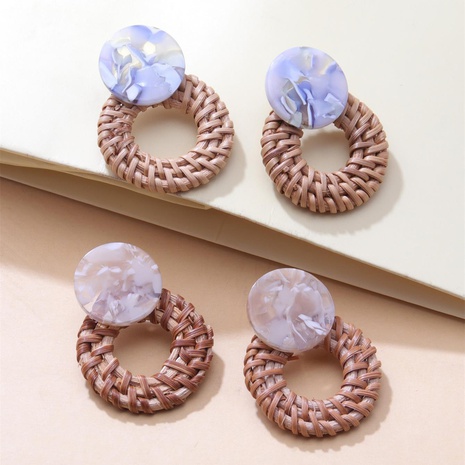 retro exaggerated hollow hand-woven ethnic rattan earrings's discount tags